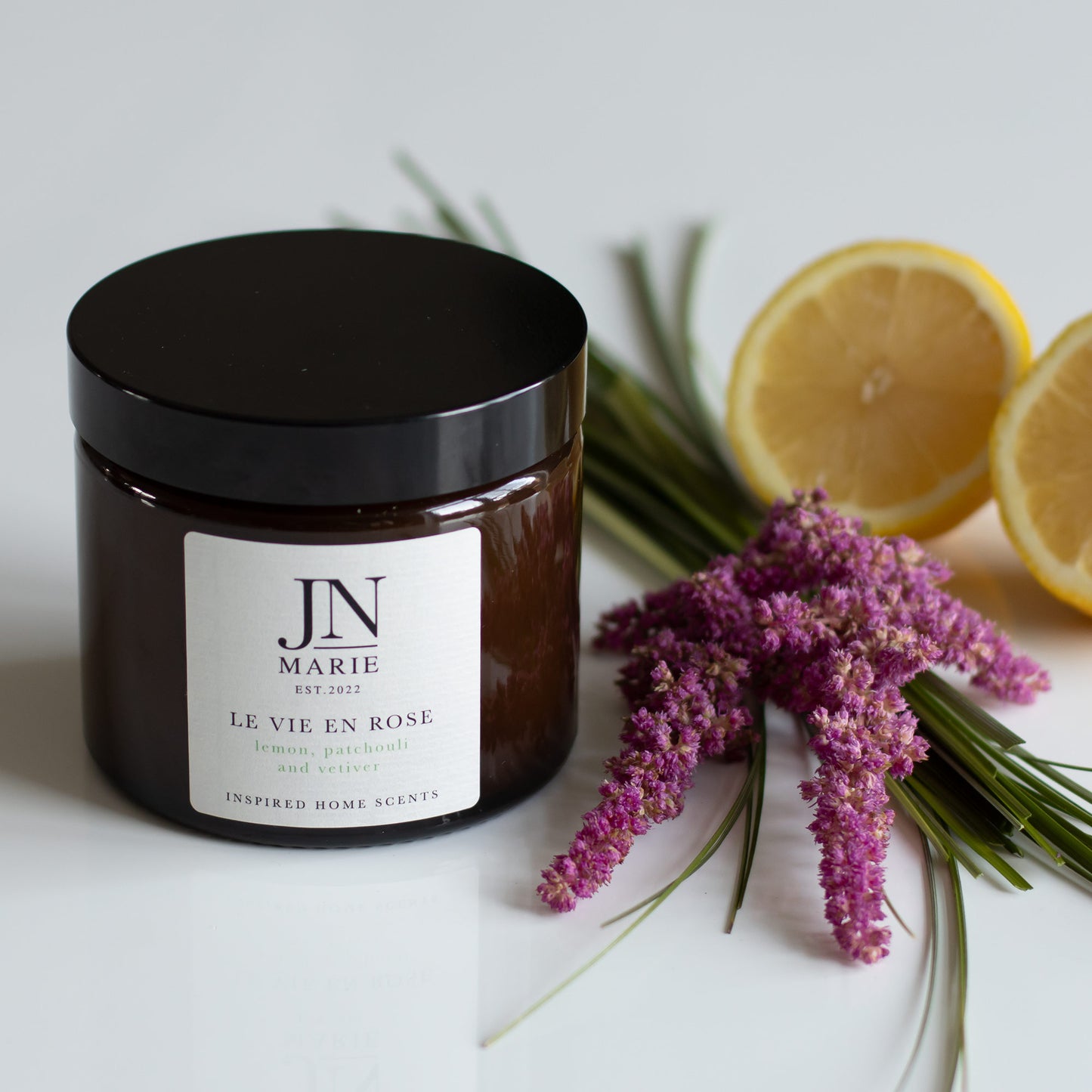 NOW WITH 25% OFF!                  Le Vie En Rose - Lemon, Patchouli & Vetiver Candle.