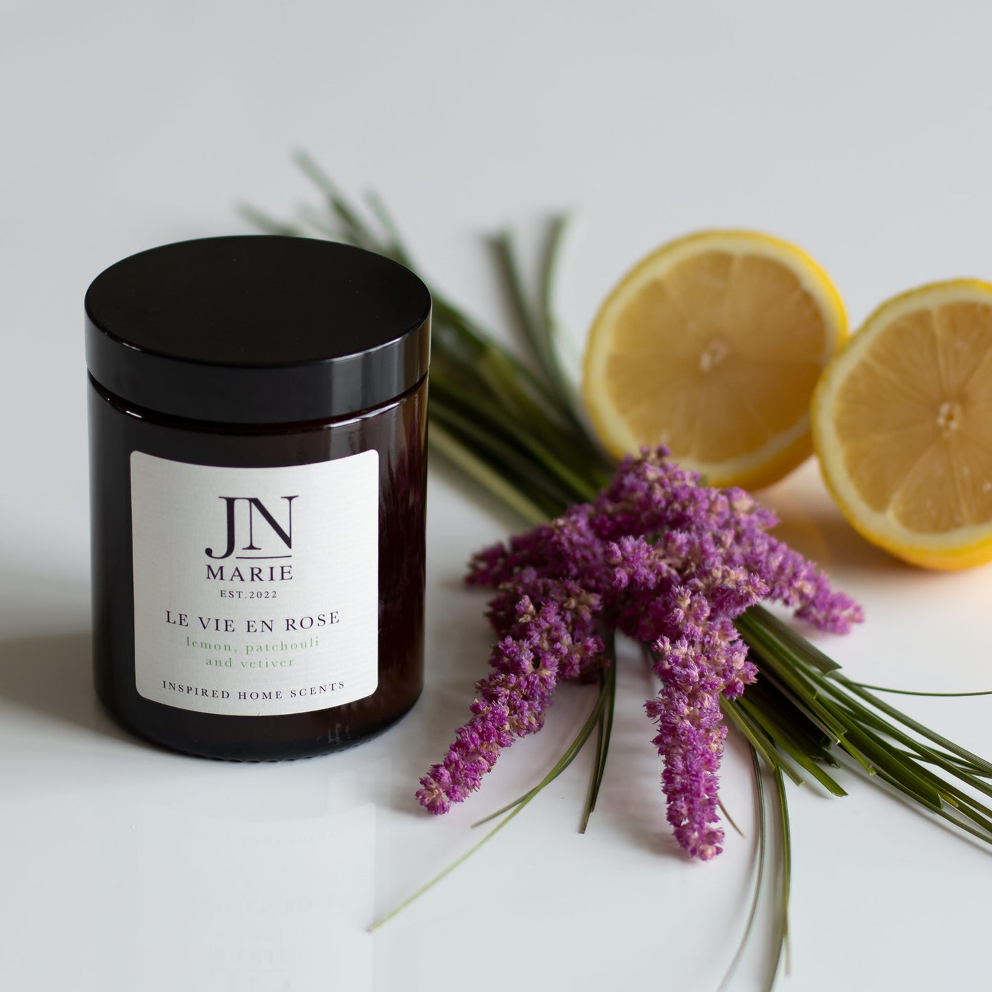 NOW WITH 25% OFF!                  Le Vie En Rose - Lemon, Patchouli & Vetiver Candle.